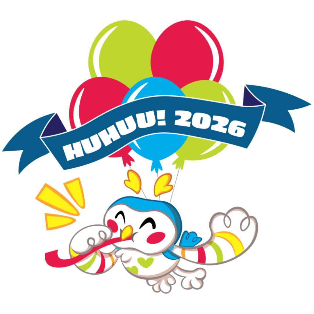 Hiihku-pöllö ilmapallojen kanssa